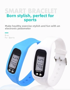 Detail of blue and white silicone smart pedometer bracelets with LCD screens and mode buttons