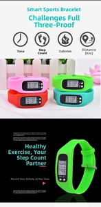 Close-up of colorful silicone fitness trackers with LCD screen and pedometer functions