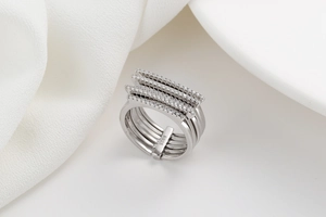 Detailed macro view of S925 sterling silver multi-layer ring with sparkling cubic zirconia