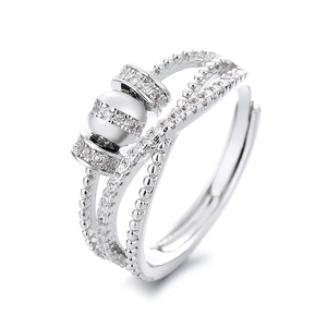 Silver multi-layer crossover spinning ring with sparkling cubic zirconia accents