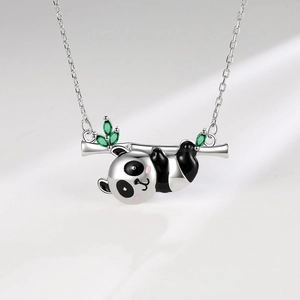 Cute panda necklace in S925 sterling silver with green gemstones and black enamel details