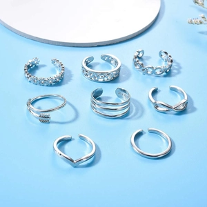 Detailed set of 8 silver adjustable toe rings with floral and bohemian carvings