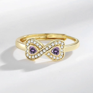 Anello cuore infinito dorato con cristalli viola e accenti di zirconi pavé