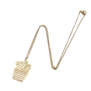 Minimalist gold stainless steel necklace with hollow cactus plant pendant on white background