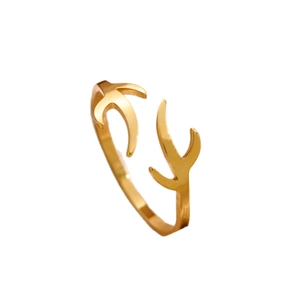 Minimalist adjustable golden elk antler ring with polished branch structure on white background