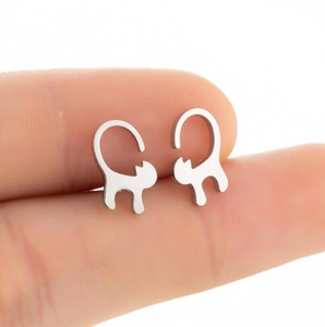 Minimalist silver stainless steel cat ear studs featuring a delicate hollow silhouette
