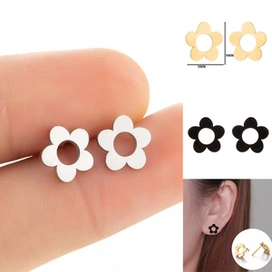 Detailed view of 9mm hollow flower stud earrings in silver, gold, and black steel