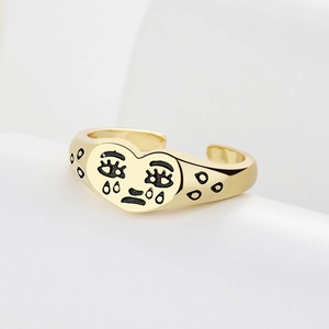 Bague cœur dorée ajustable style vintage avec visage triste et détails en émail noir