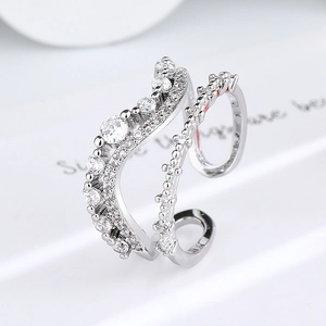 Silver double-layer wave ring with shimmering zircon stones and adjustable open band