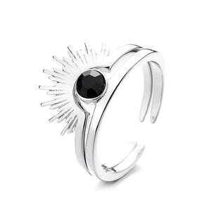 Minimalist adjustable silver ring with sunburst design and black faceted gemstone