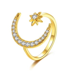 Polished golden crescent moon and star open ring with sparkling cubic zirconia stones