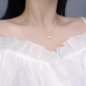 Elegant four-leaf clover necklace with white mother-of-pearl and gold chain for women
