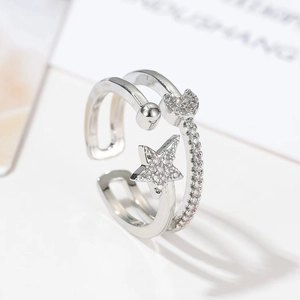 Double layered open star and heart ring with sparkling pave set zirconia stones