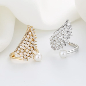 Adjustable angel wing rings in gold and silver with micro-set zircons and pearls