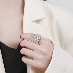 Adjustable wings open ring with micro-pave cubic zirconia and a white pearl accent