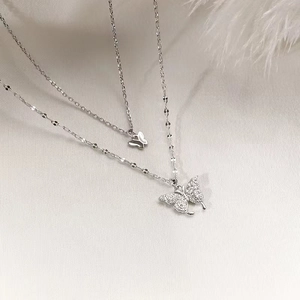 Silver double layer necklace featuring minimalist and sparkling zircon butterfly pendants