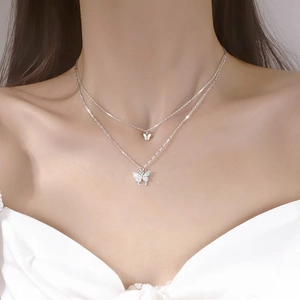 Double-layer silver butterfly pendant necklace with sparkling cubic zirconia stones