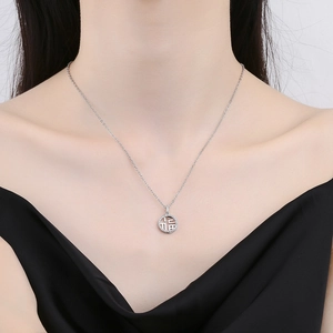 Silver hollow Fu pendant necklace with micro-paved diamonds on a double-layer chain