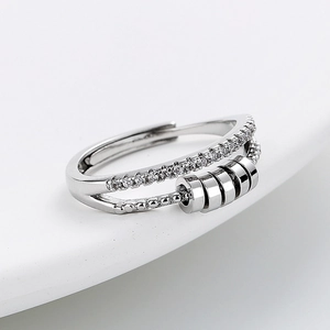Anello spinner argento a doppio strato con cristalli e perline rotanti