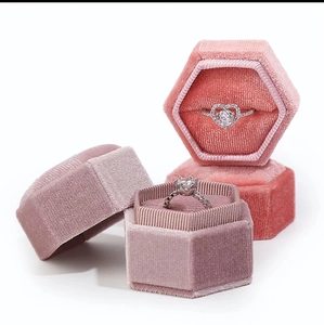 Hexagonal velvet jewelry box set with rings in soft pink and dark rose colors