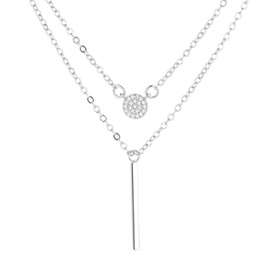Double layered silver necklace featuring a sparkling round charm and vertical bar pendant
