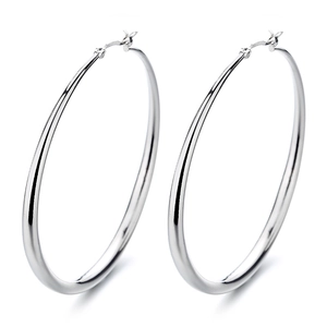 Chic silver hollow hoop earrings with geometric design and polished metallic finish