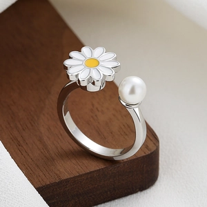 Rotating daisy flower and pearl adjustable open ring with minimalist silver band finish