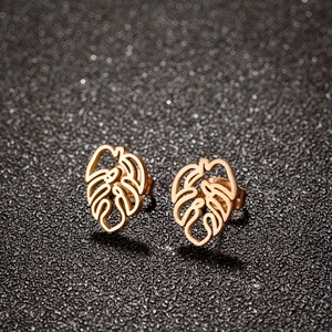 Minimalist rose gold monstera leaf stud earrings in polished stainless steel