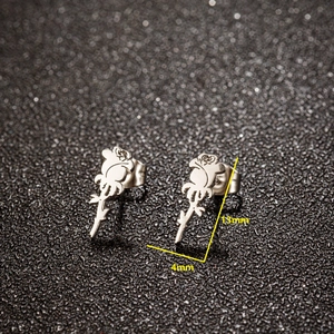 Minimalist silver rose stud earrings for women with detailed floral metalwork
