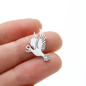 Detailed close-up of a silver stainless steel bird pendant with an olive branch