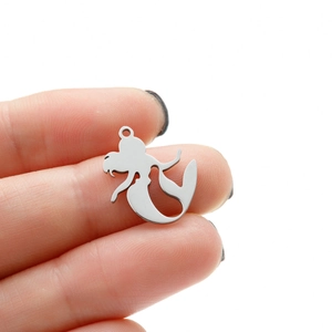 Polished stainless steel mermaid silhouette pendant for DIY jewelry making held in hand