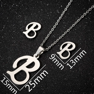Macro detail of script letter B jewelry set with pendant and earrings size dimensions
