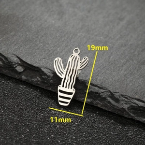 Stainless steel cactus pendant 19mm x 11mm dimensions on textured stone background