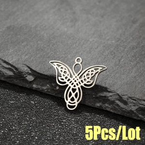5Pcs stainless steel hollow angel wing pendants with Celtic knot design on slate rock