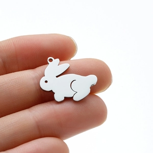 Close-up of polished silver rabbit pendant for DIY stainless steel jewelry making
