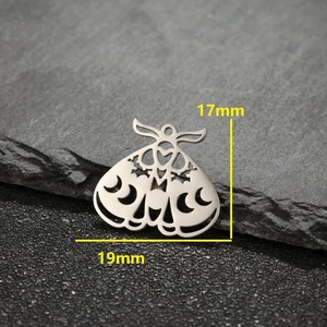 Polished stainless steel moth pendant with crescent moon phases and star cutouts