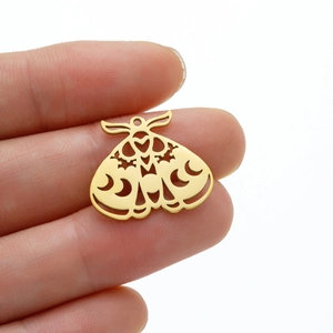 Golden moth pendant with hollow heart and moon details made of polished stainless steel