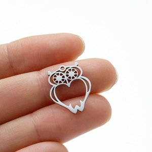 Detailed owl pendant for DIY jewelry made of hollow silver-colored stainless steel