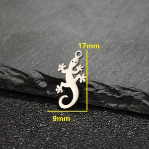 Polished silver gecko lizard stud earrings in stainless steel with 17mm size dimensions