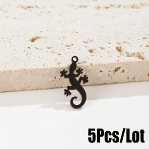 Detailed view of 5 black stainless steel lizard pendants for DIY jewelry making