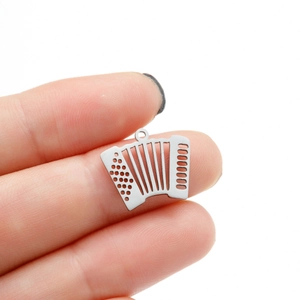 Polished stainless steel accordion pendant charm with detailed cutout design