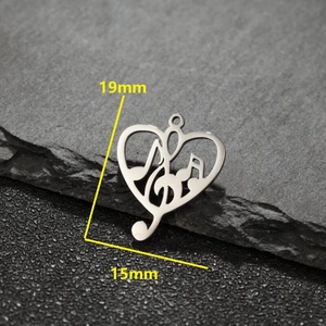Ciondolo a cuore in acciaio inox con note musicali e chiave di violino, misura 19x15mm