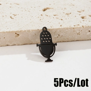 Macro shot of 5pcs matte black microphone pendants for DIY jewelry crafting