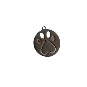 Minimalist stainless steel circular pendant featuring a cutout paw print design on white background