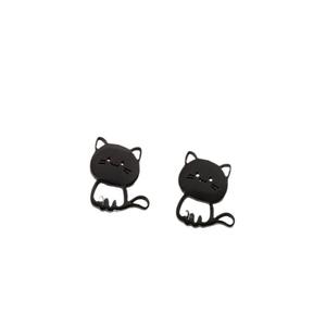 Minimalist black cat stud earrings with matte finish and hollowed tail detail