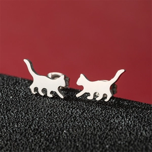 Polished silver cat silhouette stud earrings in an asymmetric minimalist animal design
