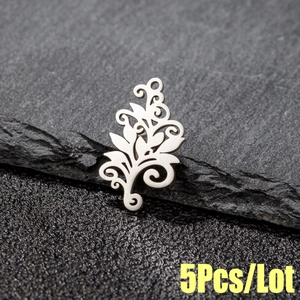 5Pcs/Lot bohemian tree of life stainless steel pendants displayed on black stone