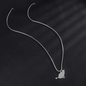 Minimalist silver stainless steel long necklace featuring a sitting cat silhouette pendant