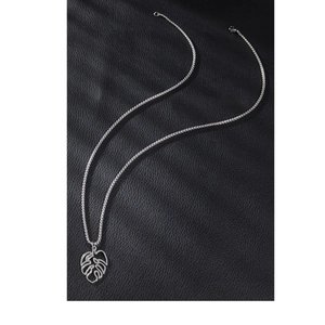 Silver stainless steel necklace with hollow monstera leaf pendant on black leather