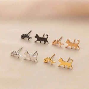 Minimalist cat and fish bone stud earrings set in black silver gold and rose gold